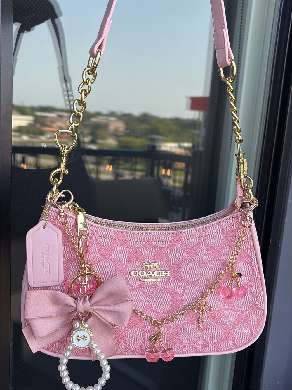 Coach Pink Signature Shoulder Bag with Bow and Charm